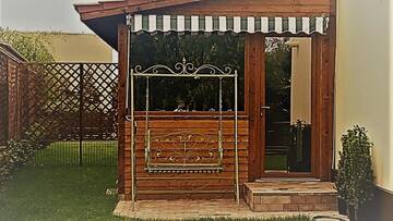 Фото номера Вилла с 1 спальней Виллы Casa Ela г. Prim Decembrie 8
